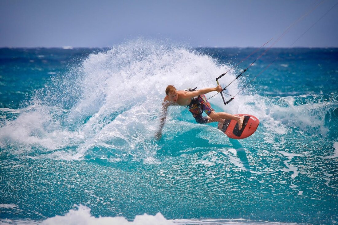 Kitesurfer riding waves in Tarifa, Spain