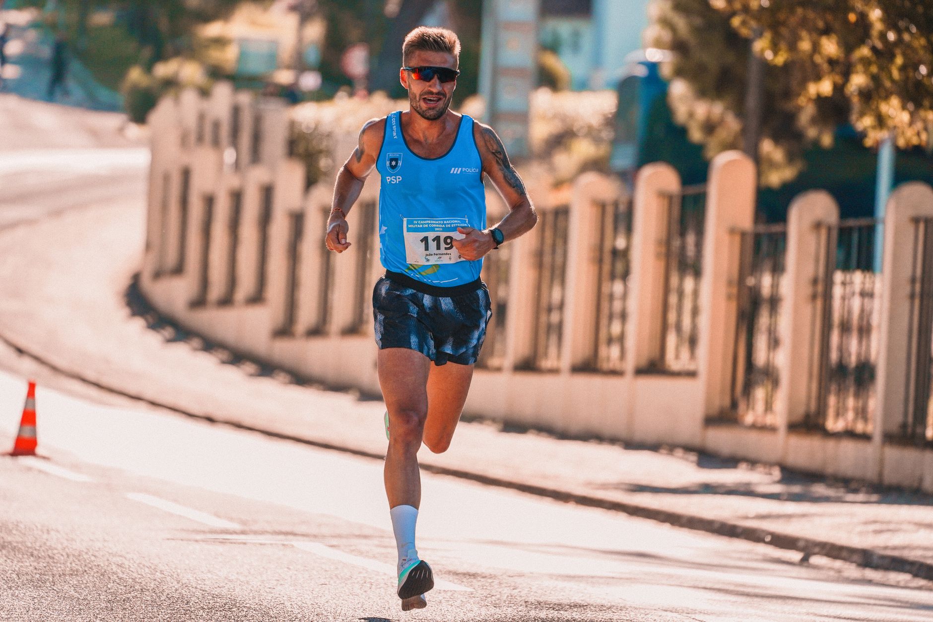Endurance runner battling heat on the road